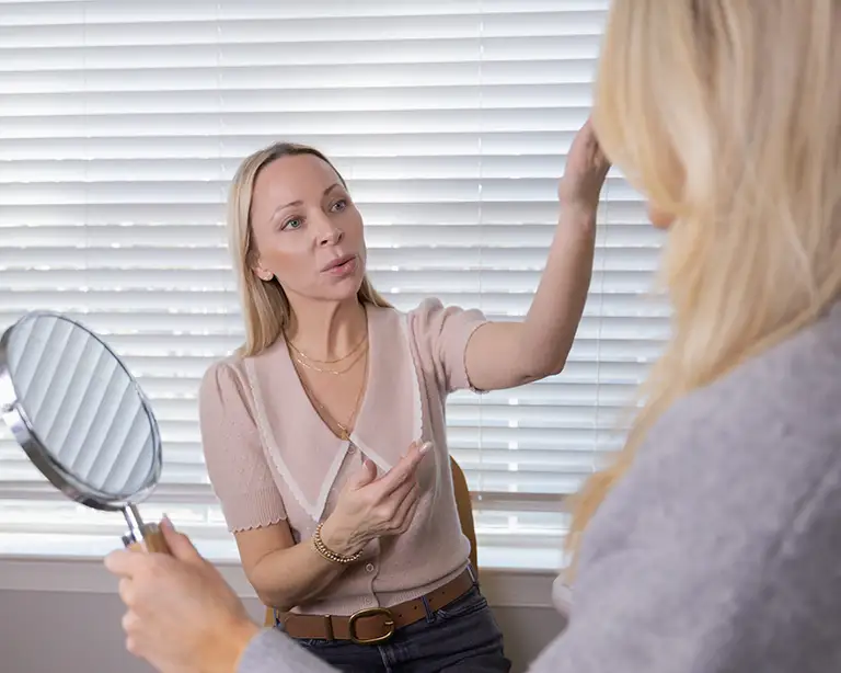 jennifer-consulting-with-client-during-appointment