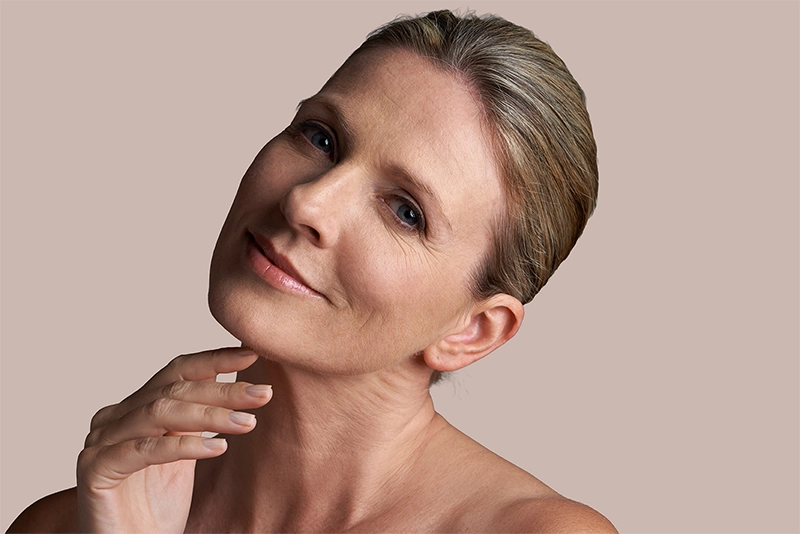 woman-posing-with-hand-on-neck-800px